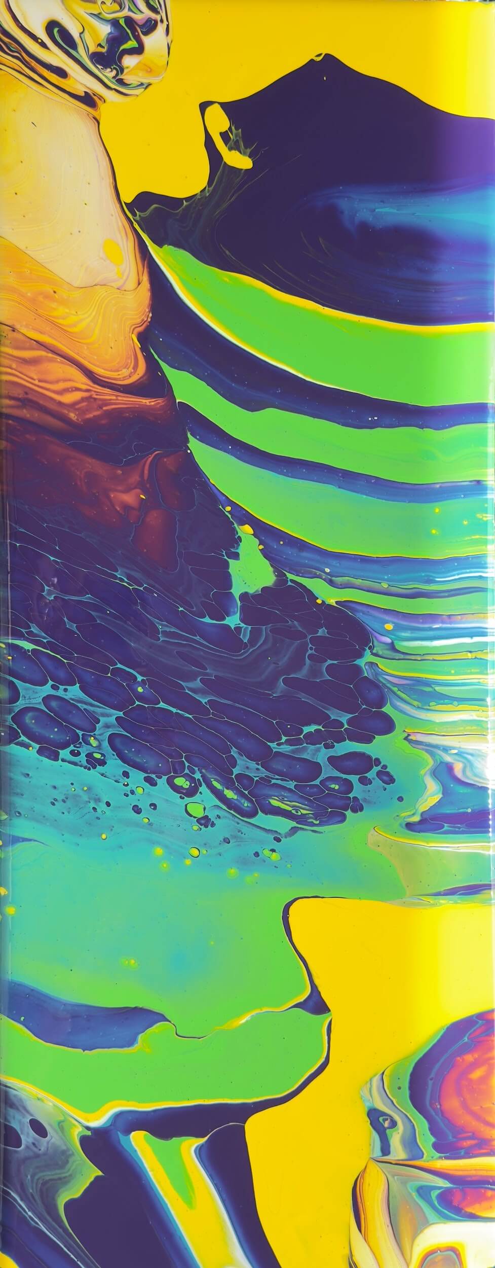 Abstract image featuring wavy streaks of yellow, green, blue, and purple paint blending together with splashes and marbled effects—a vivid, fluid composition inspired by the creative spirit of Greenway Lane Art Studio.